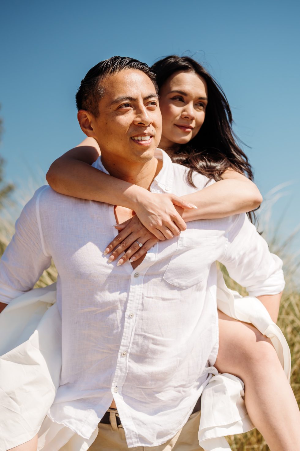 Gorgeous couple on a beach pre wedding shoot with Lancashire wedding photographer