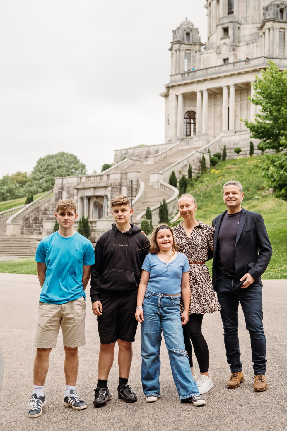Lovely family in front of Ashton Memorial during their session with Lancashire family photographer