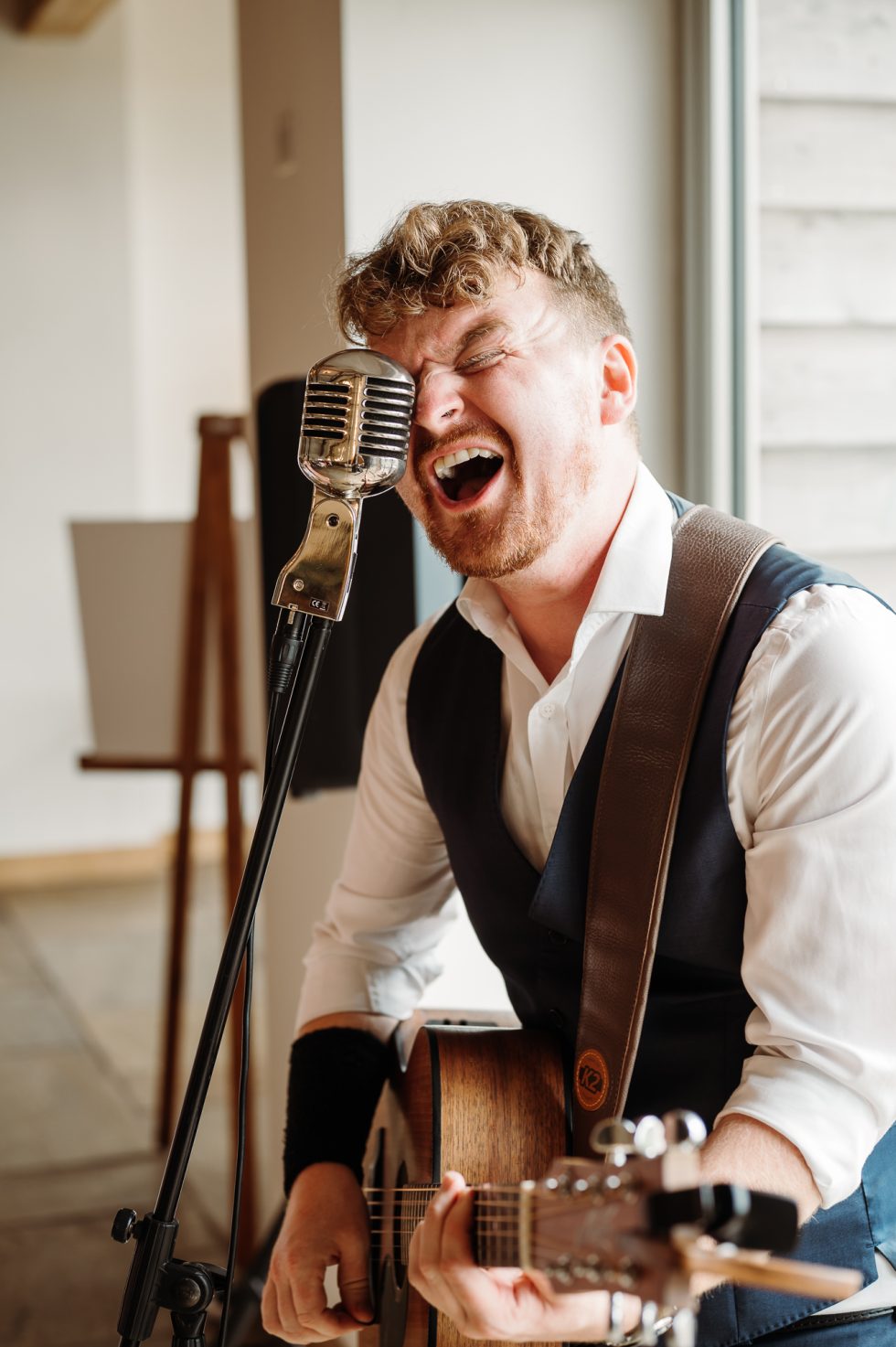Male wedding singer doing his thing