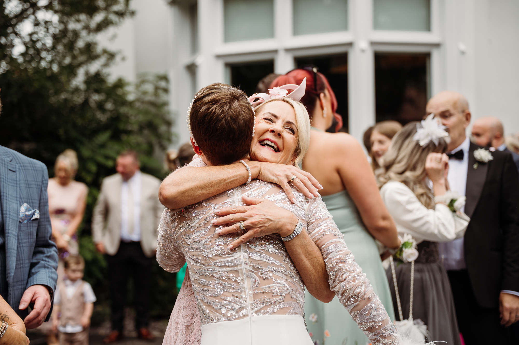 Bride giving her Mum a massive hug