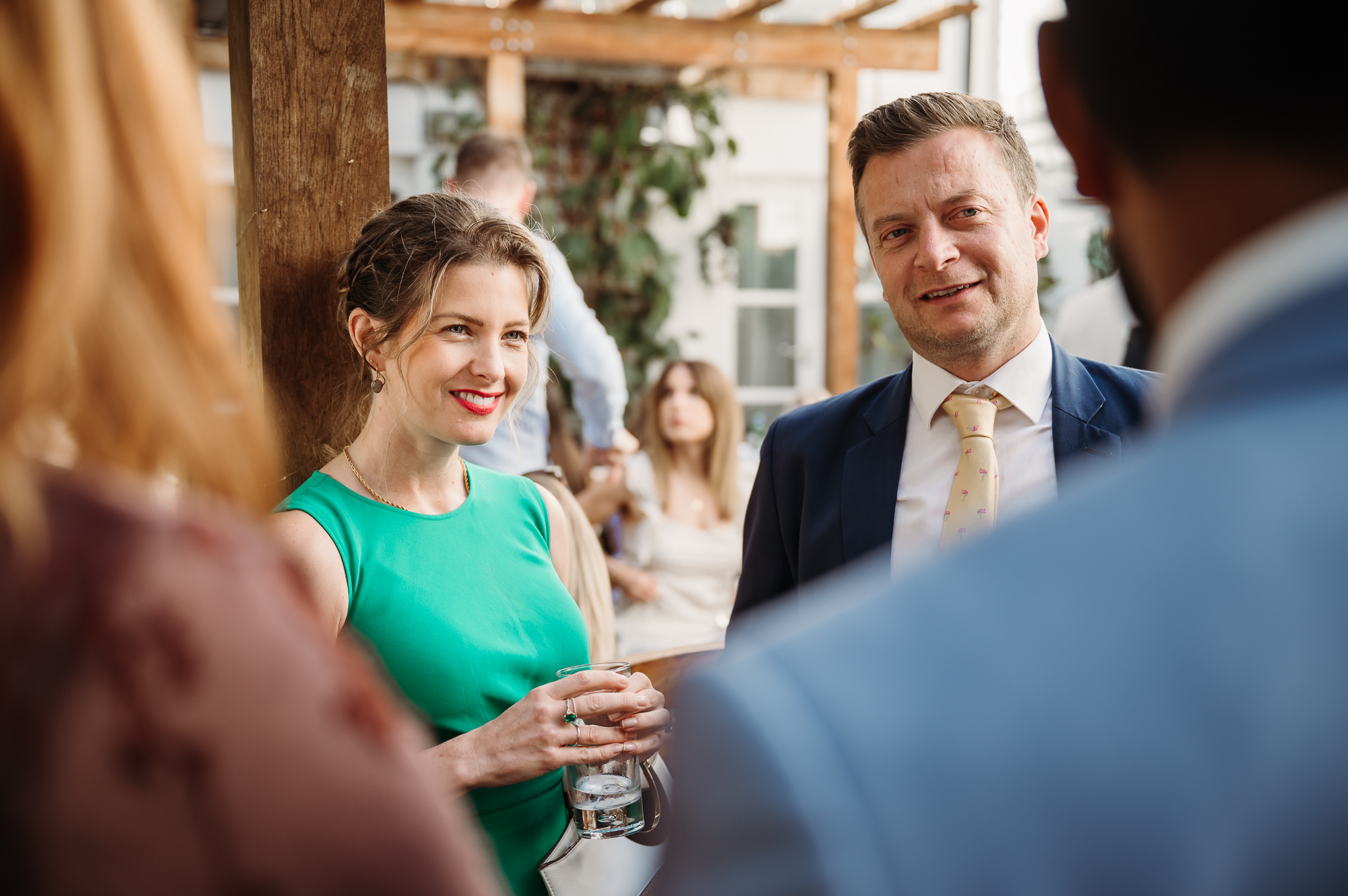 Guests chatting at a wedding in manchester