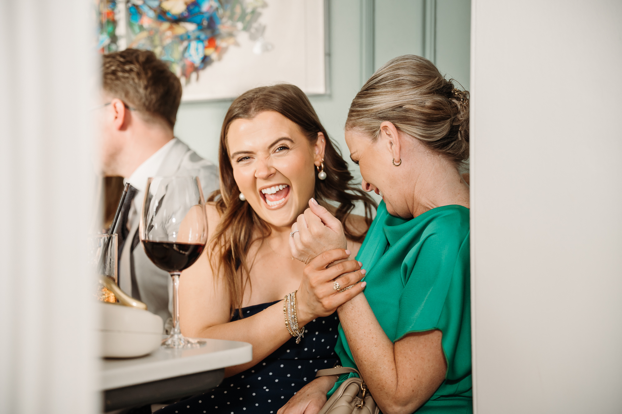Wedding guests laughing