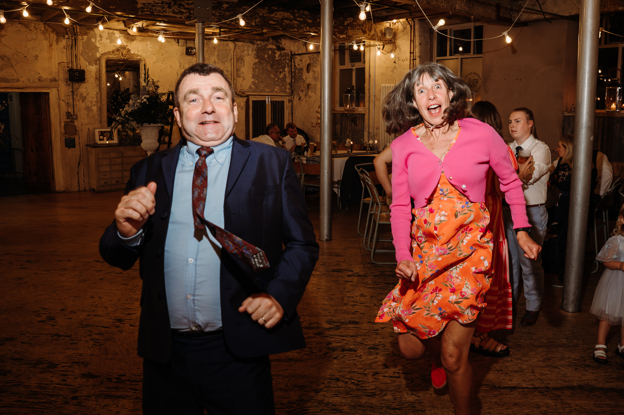 Bride and groom dancing by Lancashire wedding photographer