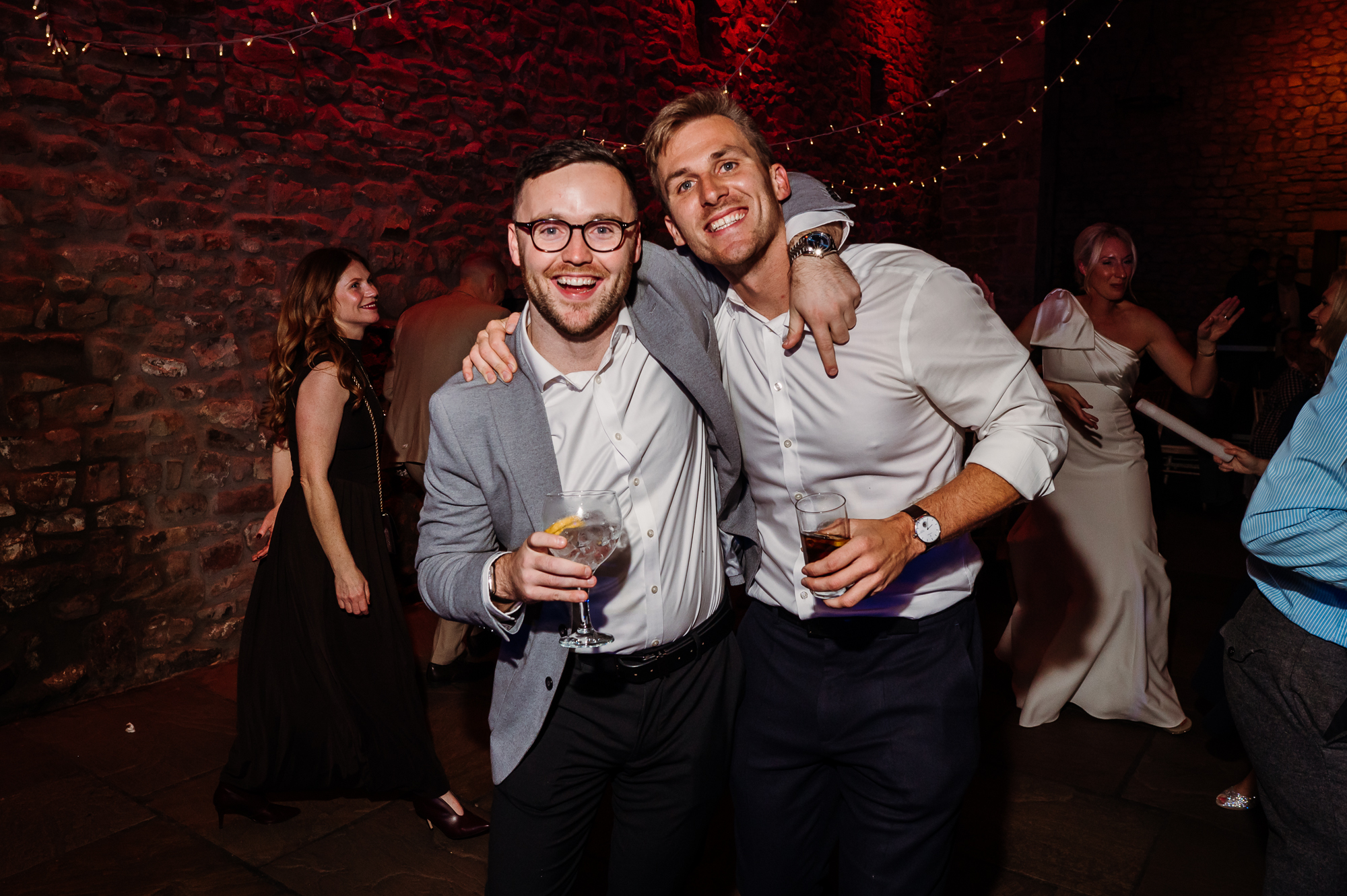 two men dancing on the dance floor.